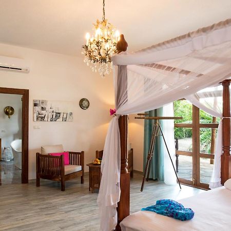 Tikitam Palms Boutique Hotel Pongwe Exterior photo