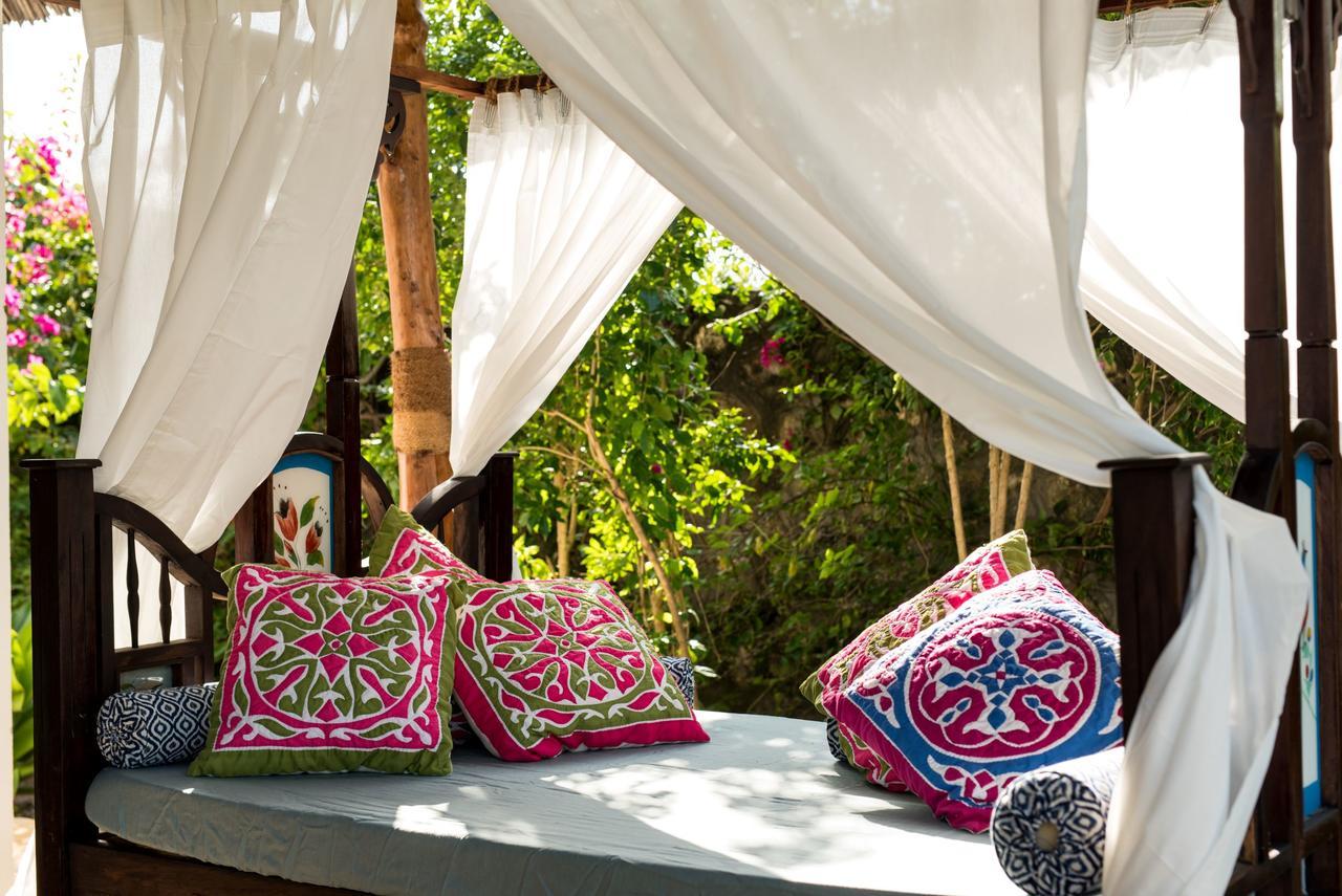 Tikitam Palms Boutique Hotel Pongwe Exterior photo