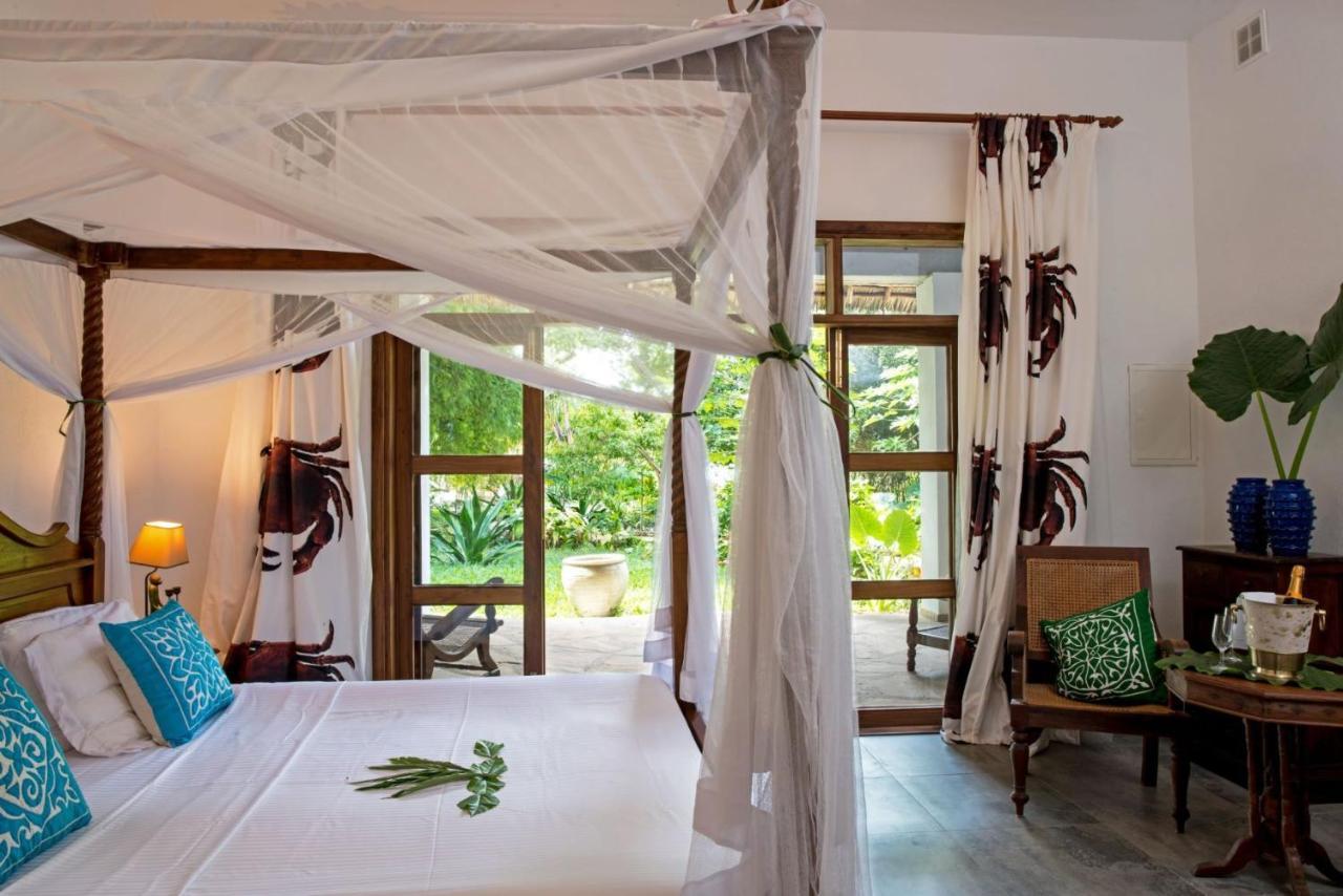Tikitam Palms Boutique Hotel Pongwe Room photo