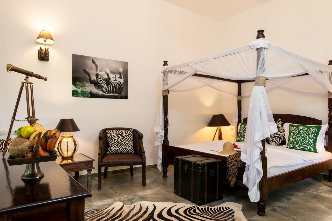 Tikitam Palms Boutique Hotel Pongwe Exterior photo