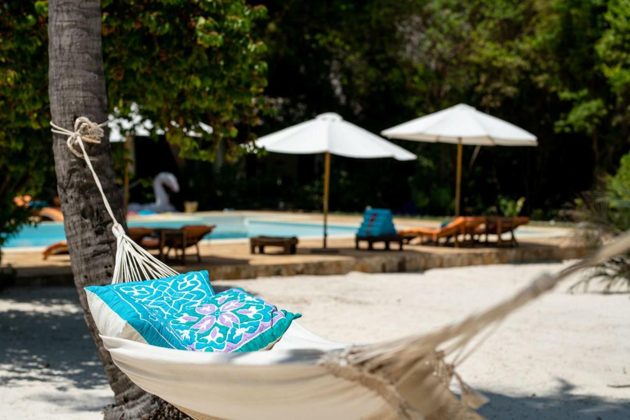 Tikitam Palms Boutique Hotel Pongwe Exterior photo